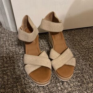 Nude, stretchy ankle strap wedges